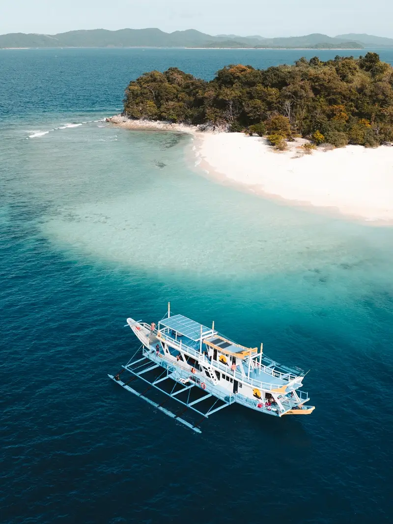 Seatours expedition boat on the Coron to El Nido reverse route at a Linapacan island