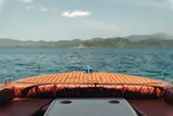 View from the bow of the Seatours premium speedboat with diamond-stitched leather seating and teak deck, El Nido Palawan